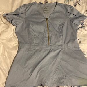 Medium Jaanuu scrub top with small stain from highlighter!